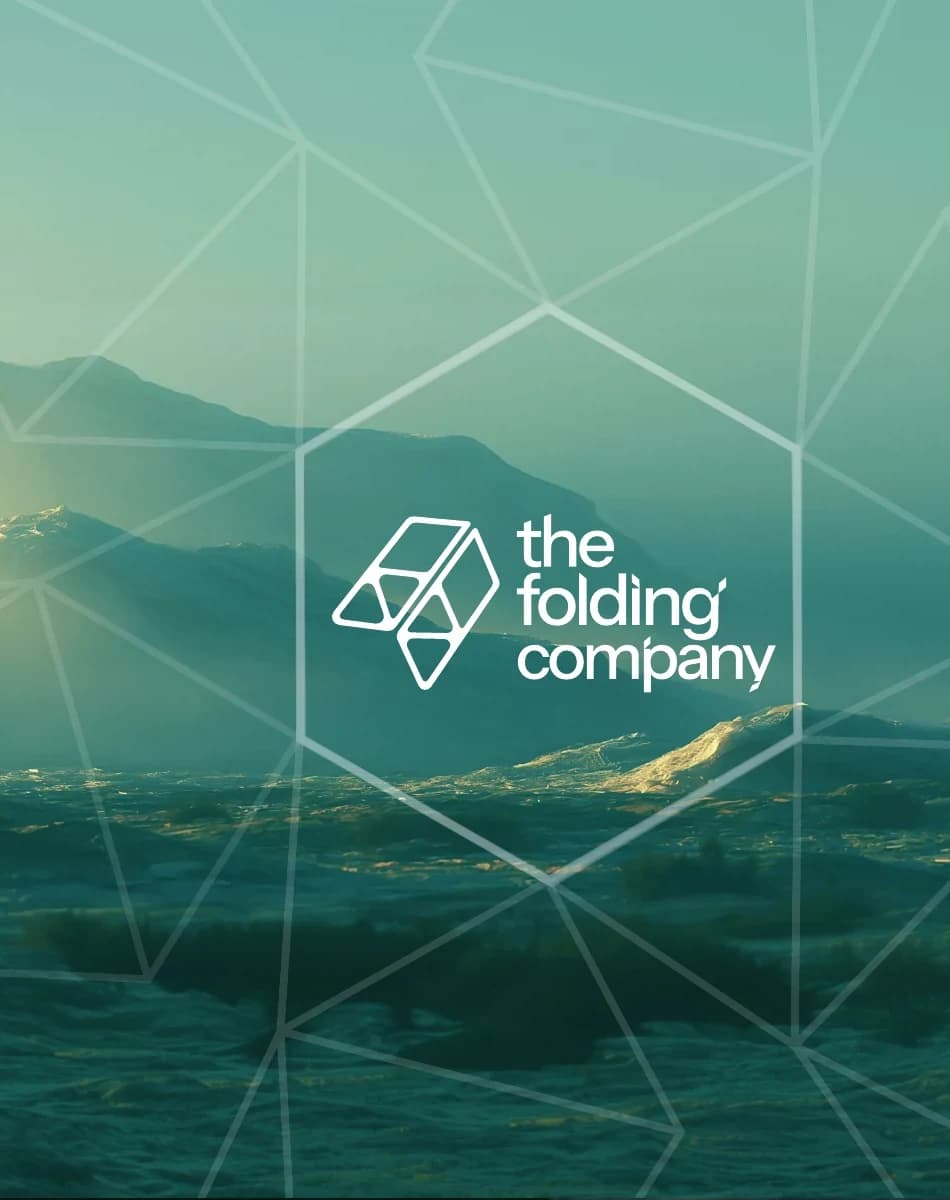 The Folding Company identity over a teal mountain landscape